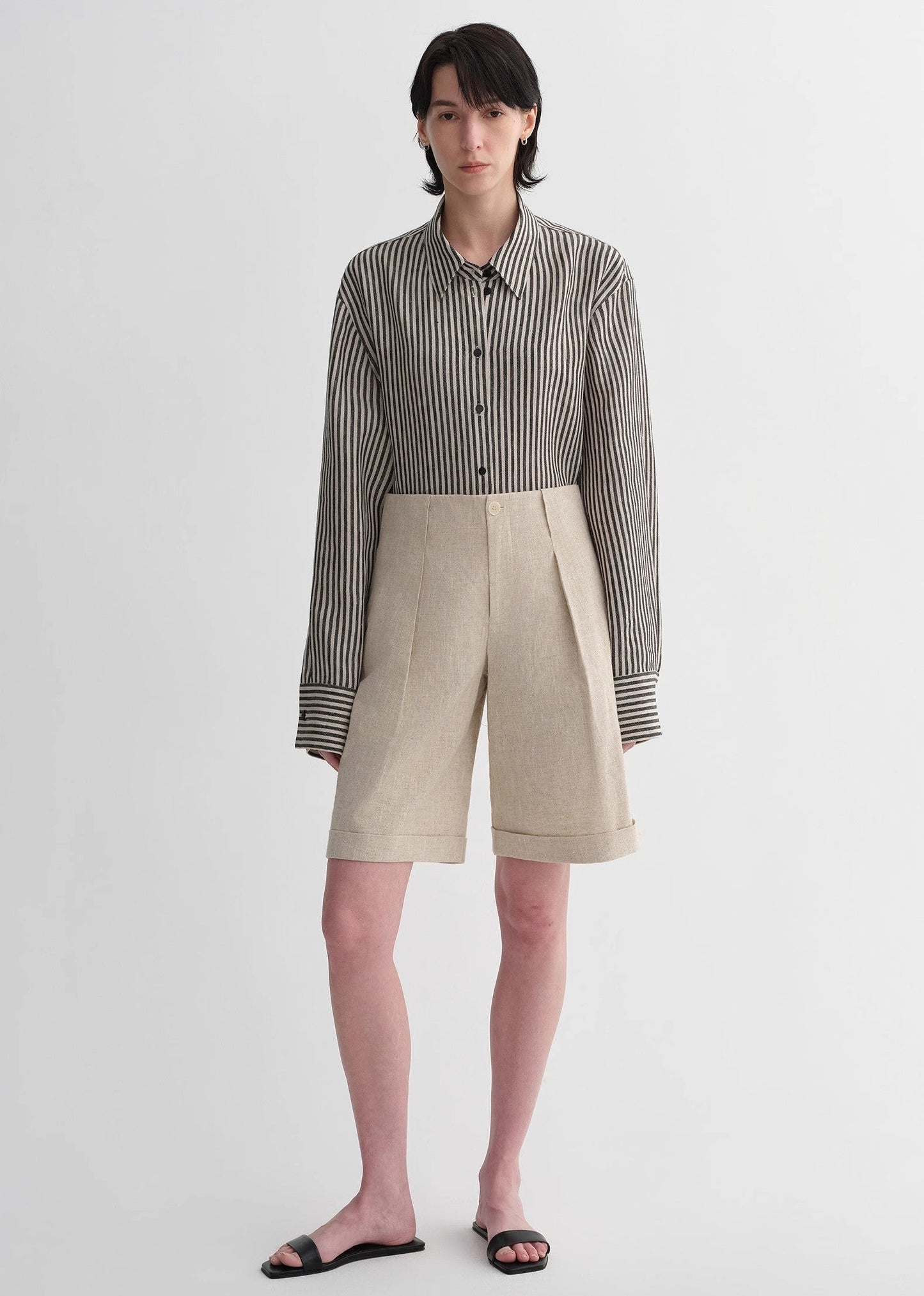 Sophisticated linen waistless pleated wide-leg cropped pants for women, featuring architectural silhouette, textured side pockets-0