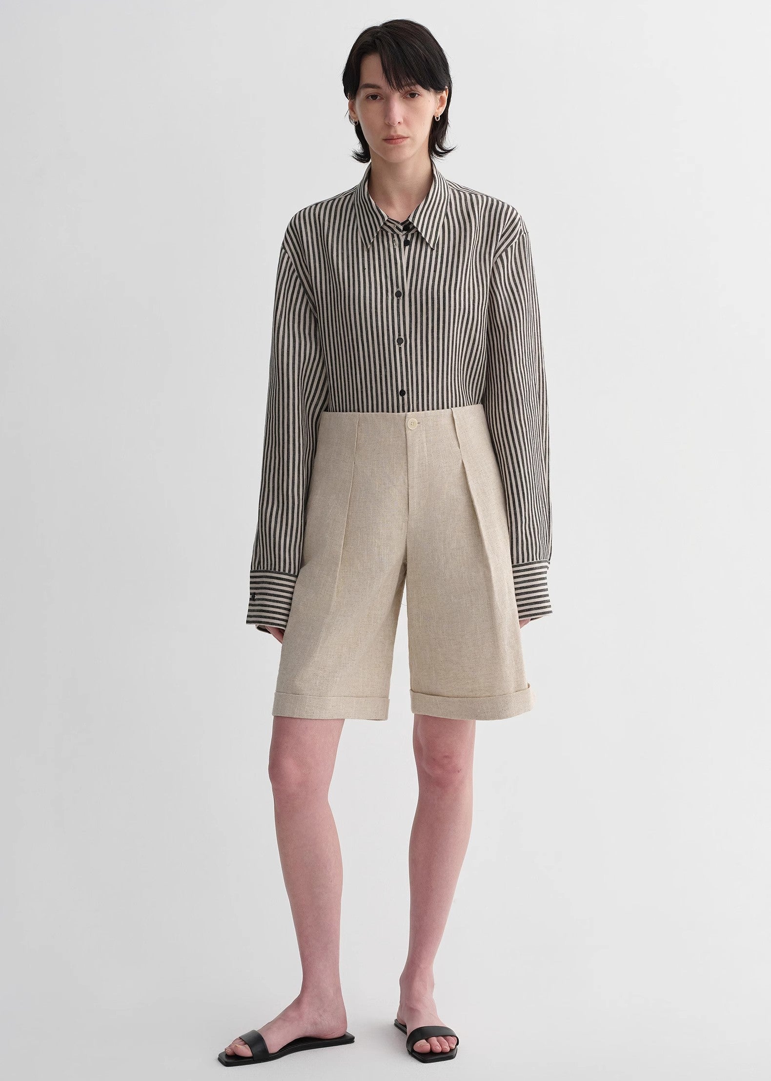 Sophisticated linen waistless pleated wide-leg cropped pants for women, featuring architectural silhouette, textured side pockets-0